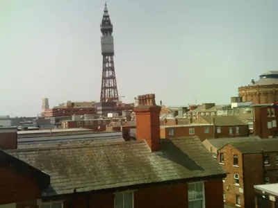 a view of the eiffel tower from the roofs of buildings at Arlingtons in Blackpool