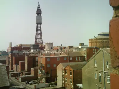 a view of a city with a tower in the background at Arlingtons in Blackpool