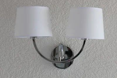 two lights hanging on a wall at The Ashley in Morecambe