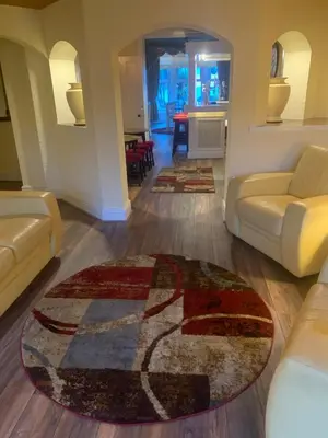 a living room with a couch and a rug on the floor at Savoy in Fleetwood