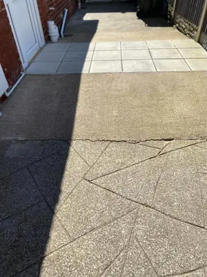 a shadow of a building on a sidewalk at COLERIDGE LODGE in Thornton