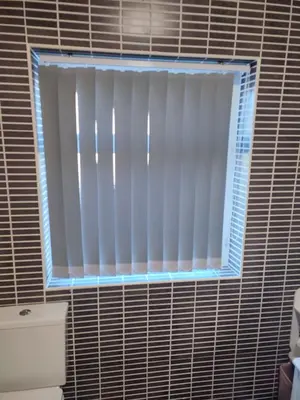 a window with a blind in a bathroom at A home away from home now with Netflix and PS4 in Blackpool