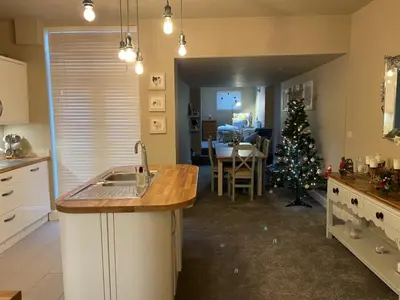 a kitchen with a christmas tree in the middle at Cosy house set in historic town of Clitheroe in Clitheroe