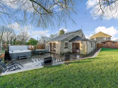 a house with a pool and a grill in a yard at Adamsons Barn in Inglewhite