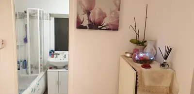 a bathroom with a sink and a toilet and a mirror at Amazing Double Liverpool in Liverpool
