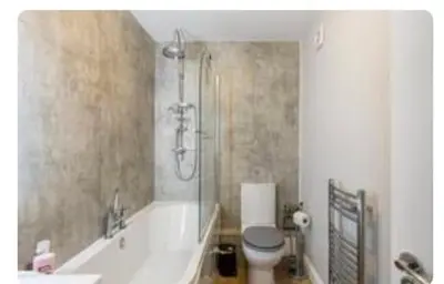 a bathroom with a tub and a toilet and a shower at Liverpool Georgian Quarter 1 Bed Apartment Sleeps 4 in Liverpool