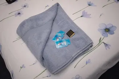 a gray sweater with a ring on it with purple flowers at The Ferndale Hotel in Blackpool