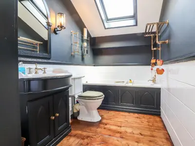 a bathroom with a toilet and a sink at The Boot Room in Preston