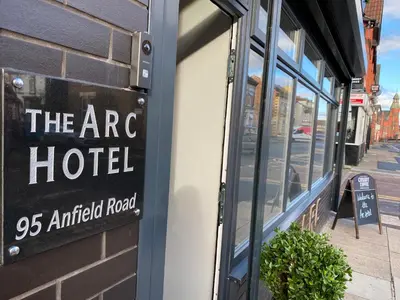 a sign for the arc hotel on the side of a building at The Arc Hotel in Liverpool