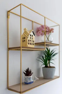 a wooden shelf with a toy house and two plants at Superb Spacious House For Contractors & Families & Private Parking By Liverpool Short Stay in Liverpool