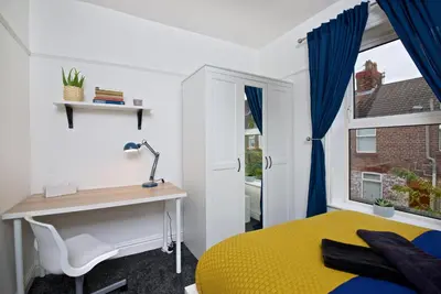 a bedroom with a desk and a bed and a window at Liverpool City Stays - Economy Room Close to city centre GG in Liverpool