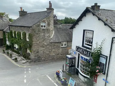 an overhead view of a building in a village at Coffee & Stays at Cartmel Square in Cartmel
