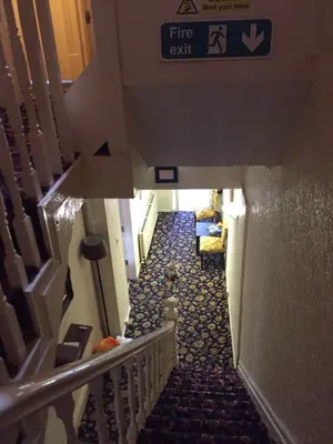 a view of a stairway in a building at MyRoomz New Discovery Hotel in Blackpool