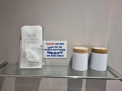 three rolls of toilet paper on a glass shelf at The Cameo in Blackpool
