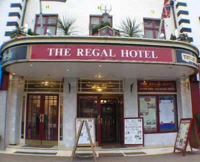 a hotel with a sign in front of it at The Regal Hotel in Blackpool