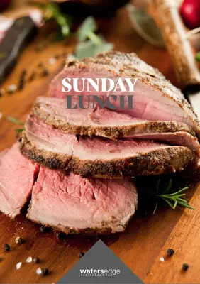 a ham sandwich on a cutting board with the words sunday lunch at 12 Borwick Lakes- Newly Refurbished in Carnforth