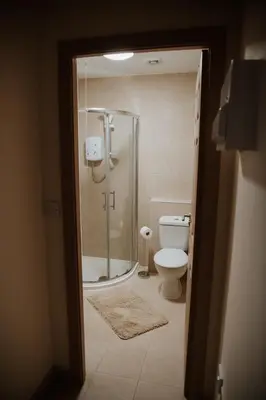 a bathroom with a shower and a toilet at Flats near football clubs in Liverpool