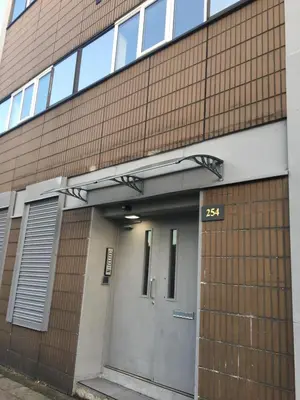 a building with a door with the number on it at Flats near football clubs in Liverpool