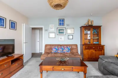 a living room with a couch and a coffee table at BEACH VIEW - Amazing Sea Views in Lytham St Annes