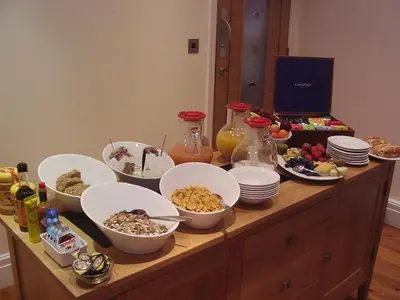 a buffet with bowls of food on a table at Langtrys in Blackpool