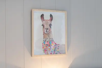 a painting of a llama on a wall at Inside No. 1 Retreat in Carnforth