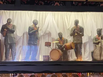 a group of men standing on a stage with instruments at Grange House Hotel in Blackpool