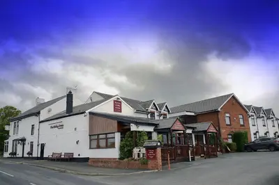 a white building on the side of a street at The Birley Arms Hotel in Preston
