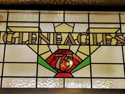 a stained glass window with the word healthcare on it at Gleneagles - Albert Road in Blackpool
