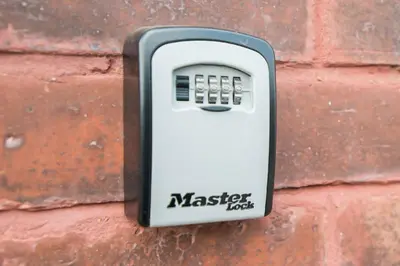 a plastic master lock on a brick wall at Modern 3BR House in Ince Ideal for Contractors & Long Stays in Pemberton