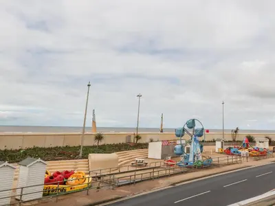 a playground with a slide and a water park at The Beach House in Cleveleys