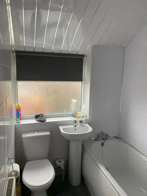 a bathroom with a toilet and a sink and a tub at Beautiful house in a perfect location in Saint Annes on the Sea