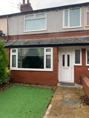 a house with a lawn in front of it at Beautiful house in a perfect location in Saint Annes on the Sea