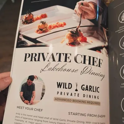 a book about private chef restaurant dining with a person eating food at Laythams Holiday Lets Retreat in Slaidburn