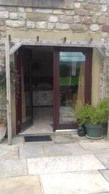 a sliding glass door of a house at Harris End in Lancaster