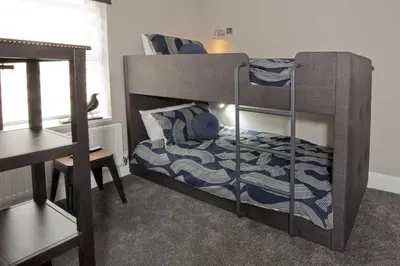 a bedroom with two bunk beds in a room at Blackbird Luxury 2 Bed Accomodation Room 8 in Blackpool