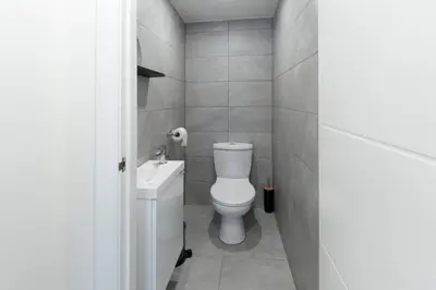 a bathroom with a toilet and a sink at Blackbird Luxury Accommodation Room 10 in Blackpool