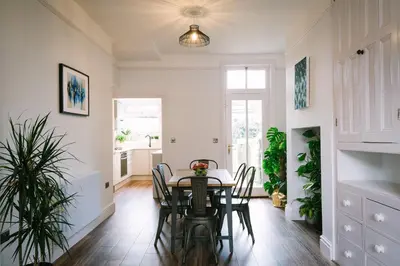 a dining room with a table and chairs at Period Retreat for 6, explore the Lake District in Lancaster