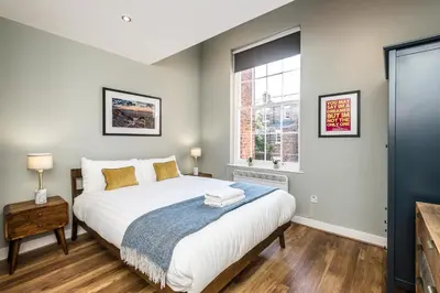 a bedroom with a bed and a window at Host & Stay - Canning Quarters in Liverpool
