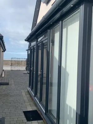 a row of windows on the side of a building at Beach View Apartment with balcony and sea view - pet friendly in Cleveleys