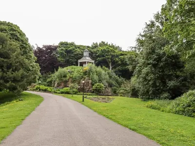 a winding road with a gazebo in the distance at 25 St Georges Quay in Lancaster