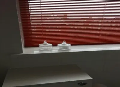 a window with two knitted objects on a window sill at The Beaucliffe Hotel in Blackpool