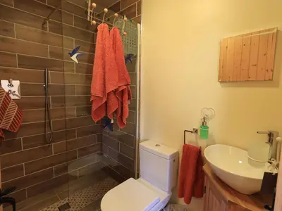 a bathroom with a toilet and a sink at Swallow cottage, Over Kellet in Over Kellet