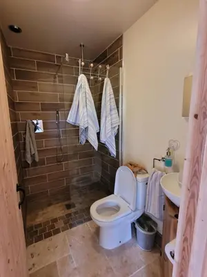 a bathroom with a toilet and a sink at Swallow cottage, Over Kellet in Over Kellet