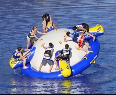 a group of people riding on an inflatable at Port Haverigg Millom in Millom