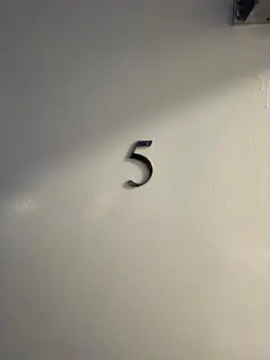 a number three on the side of a wall at County serviced accommodation in Liverpool