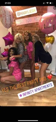 a group of girls posing for a picture at a party at Infinity PartyPadsLiverpool Hen and Stag Welcome in Liverpool