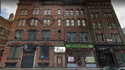 a large brick building on the corner of a street at Infinity PartyPadsLiverpool Hen and Stag Welcome in Liverpool