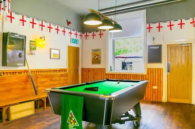 a billiard room with a pool table in it at OYO Castle Hotel, Accrington in Accrington