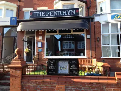 a restaurant with a sign that reads the perty sqor at The Penrhyn in Blackpool