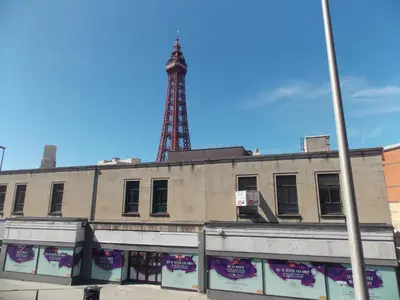 an old building with a tower in the background at Topaz Blackpool in Blackpool